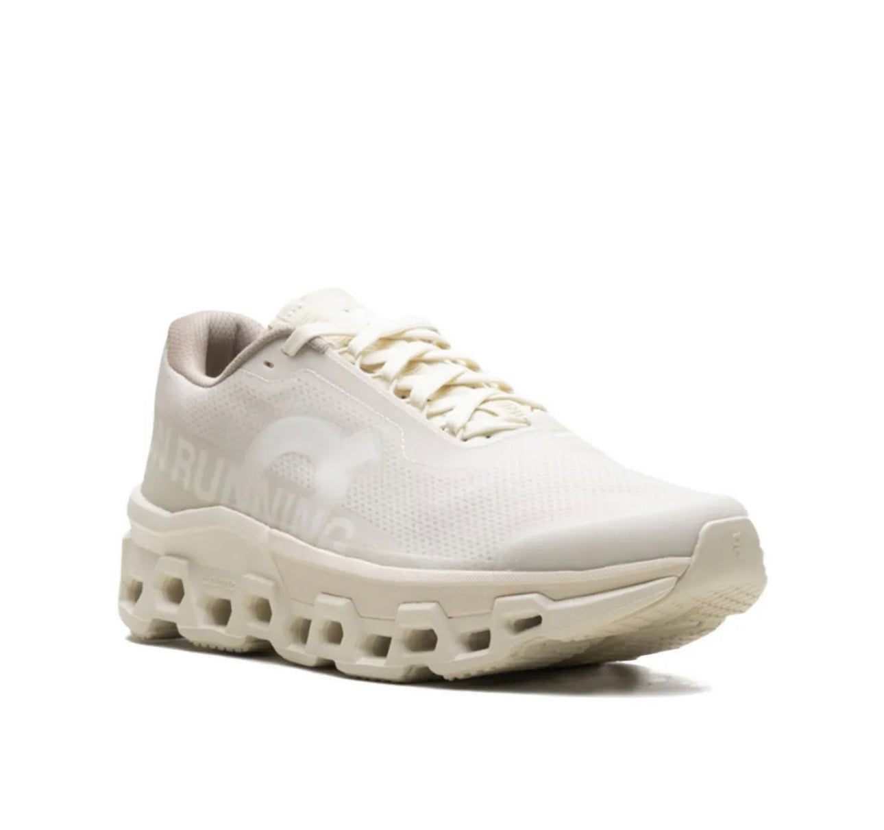 On Cloudmonster cream - high-performance athletic footwear with advanced cushioning