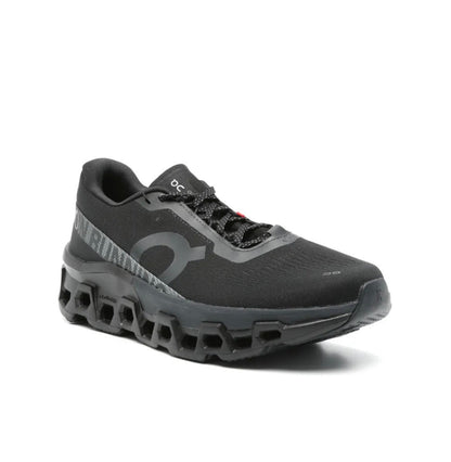 On Cloudmonster black - high-performance athletic footwear in Black with advanced cushioning